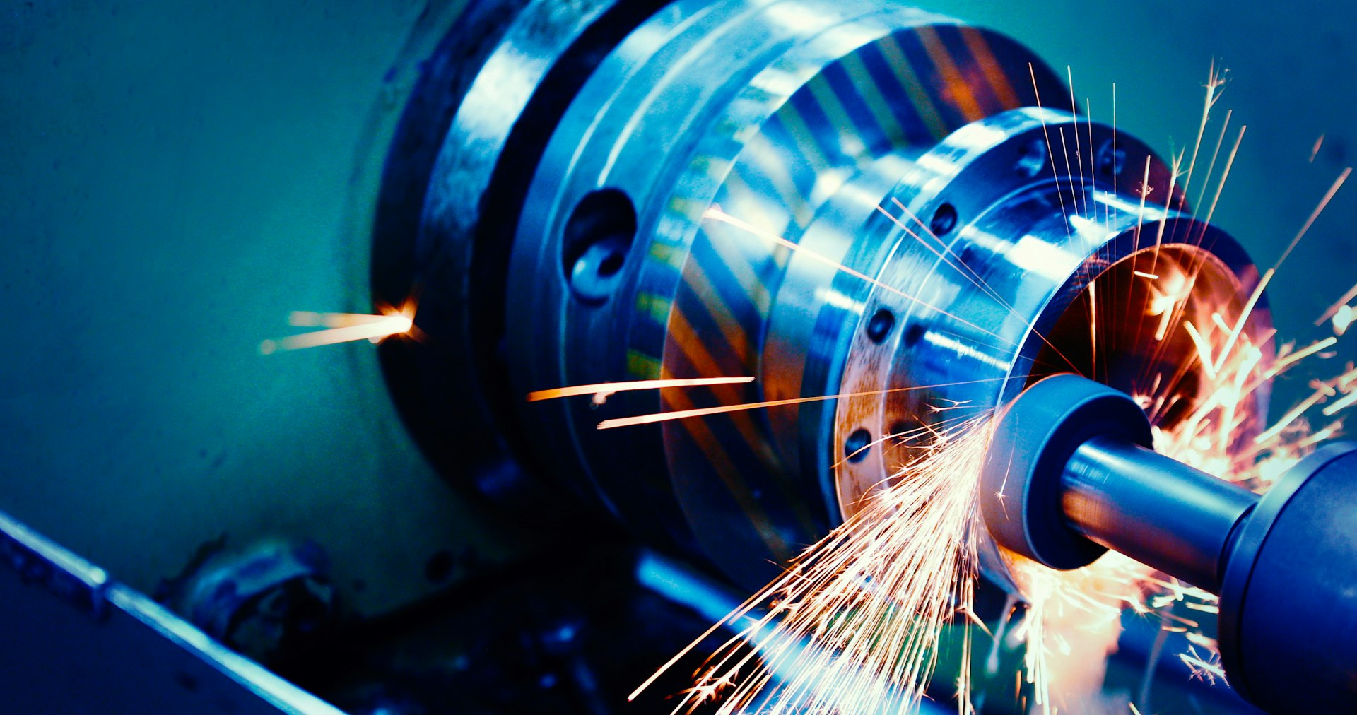 Sparks are flying during metal drilling