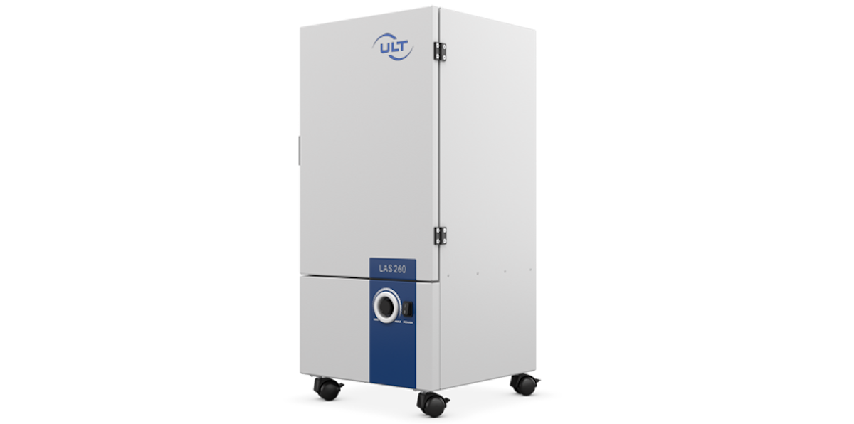 Grey system with rollers and a blue sticker on the front with device name