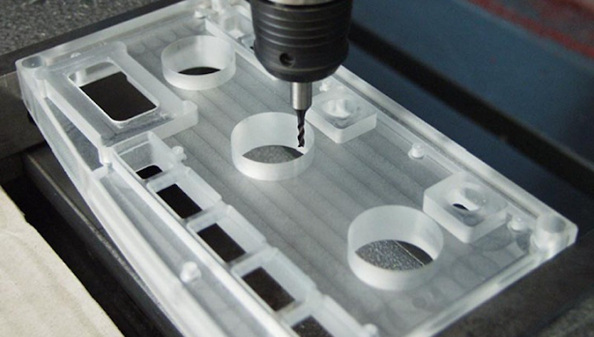 Drilling of plastics to produce a car display